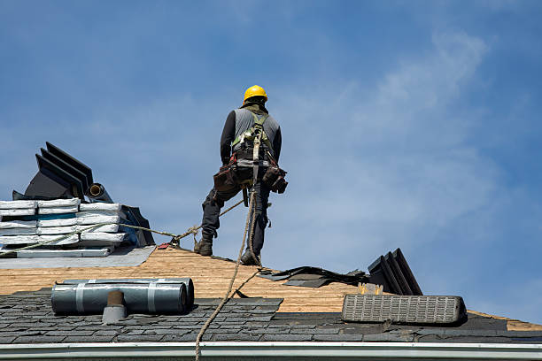 Professional Roofing technician working in Woodland, CA